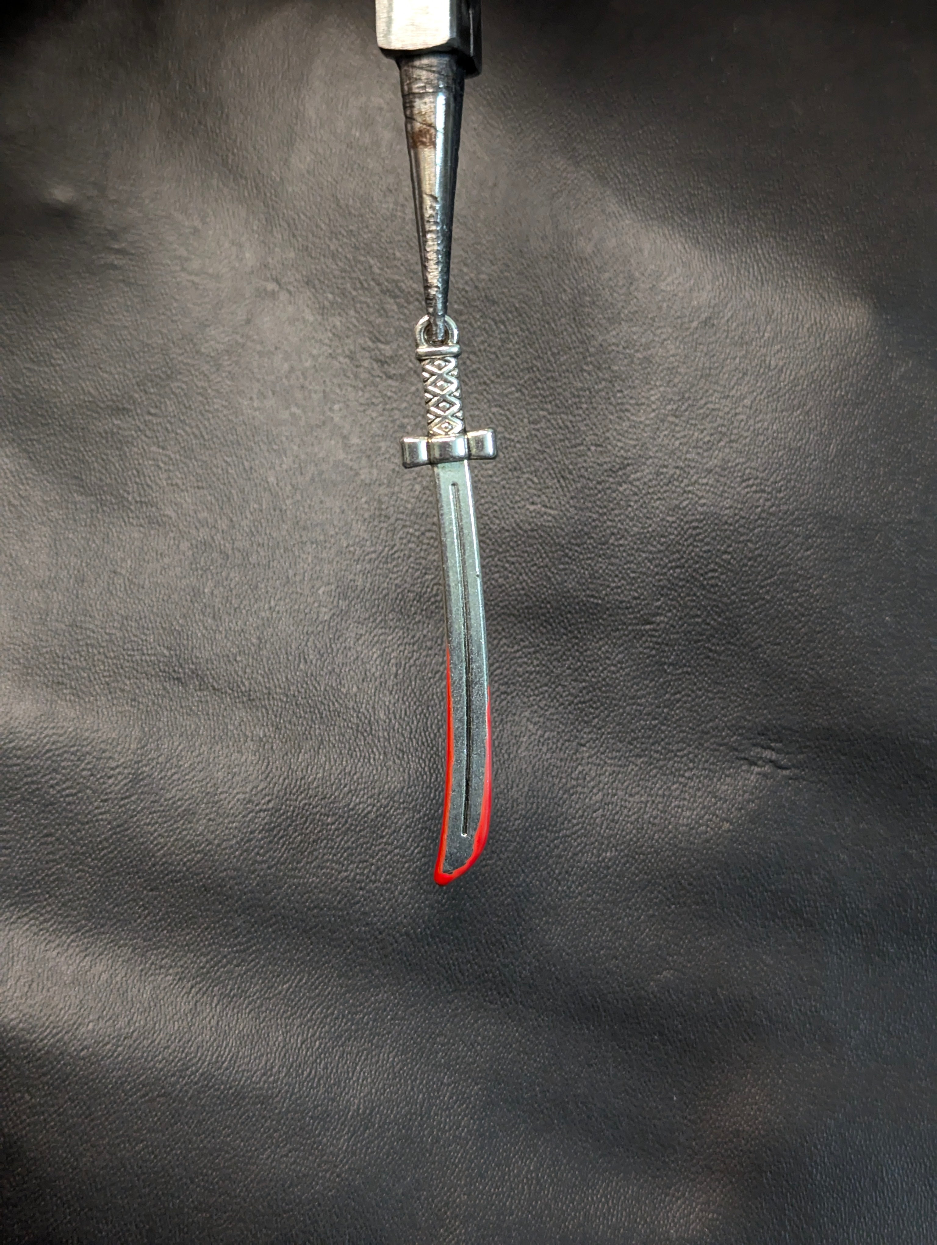 Sword pendant