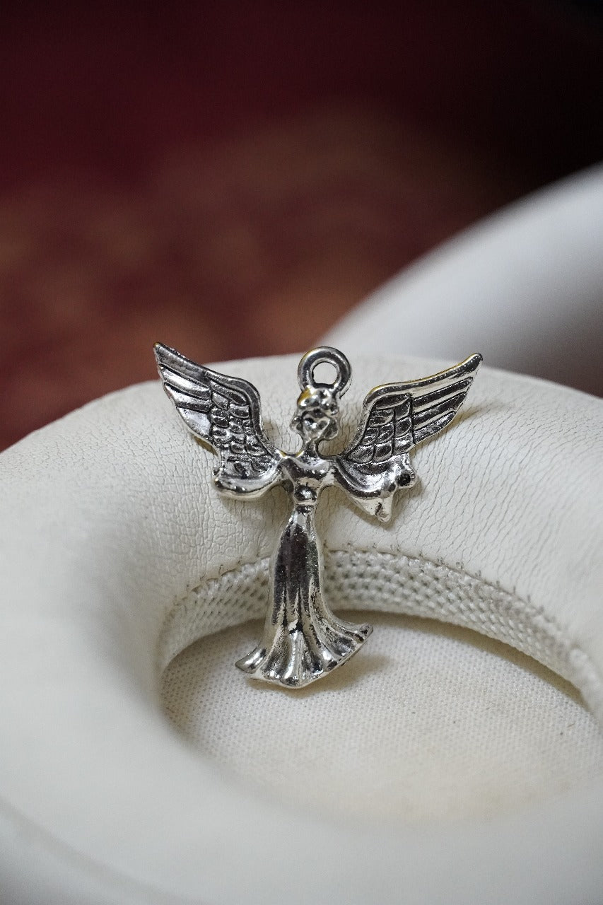 Pewter metal angel pendant.