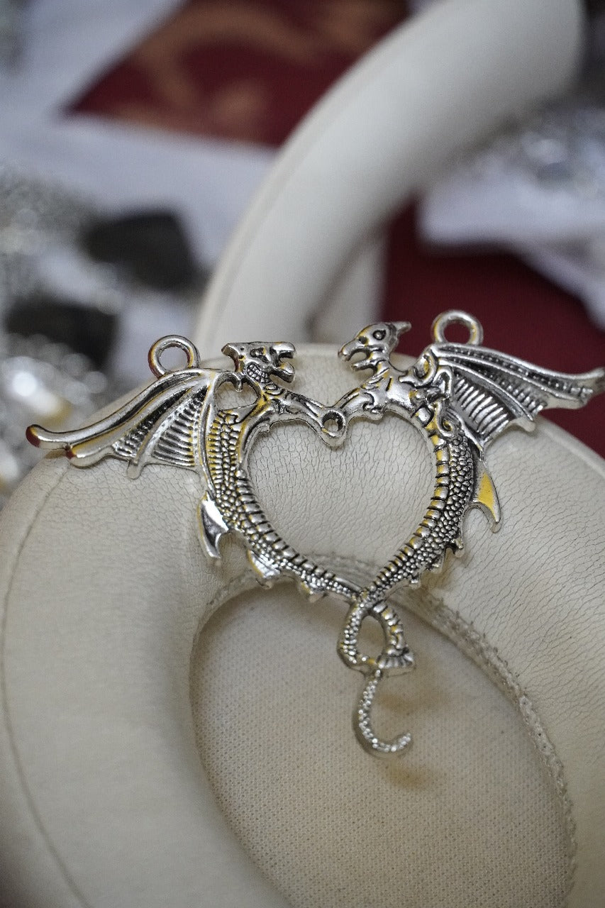 Double dragon heart pendant