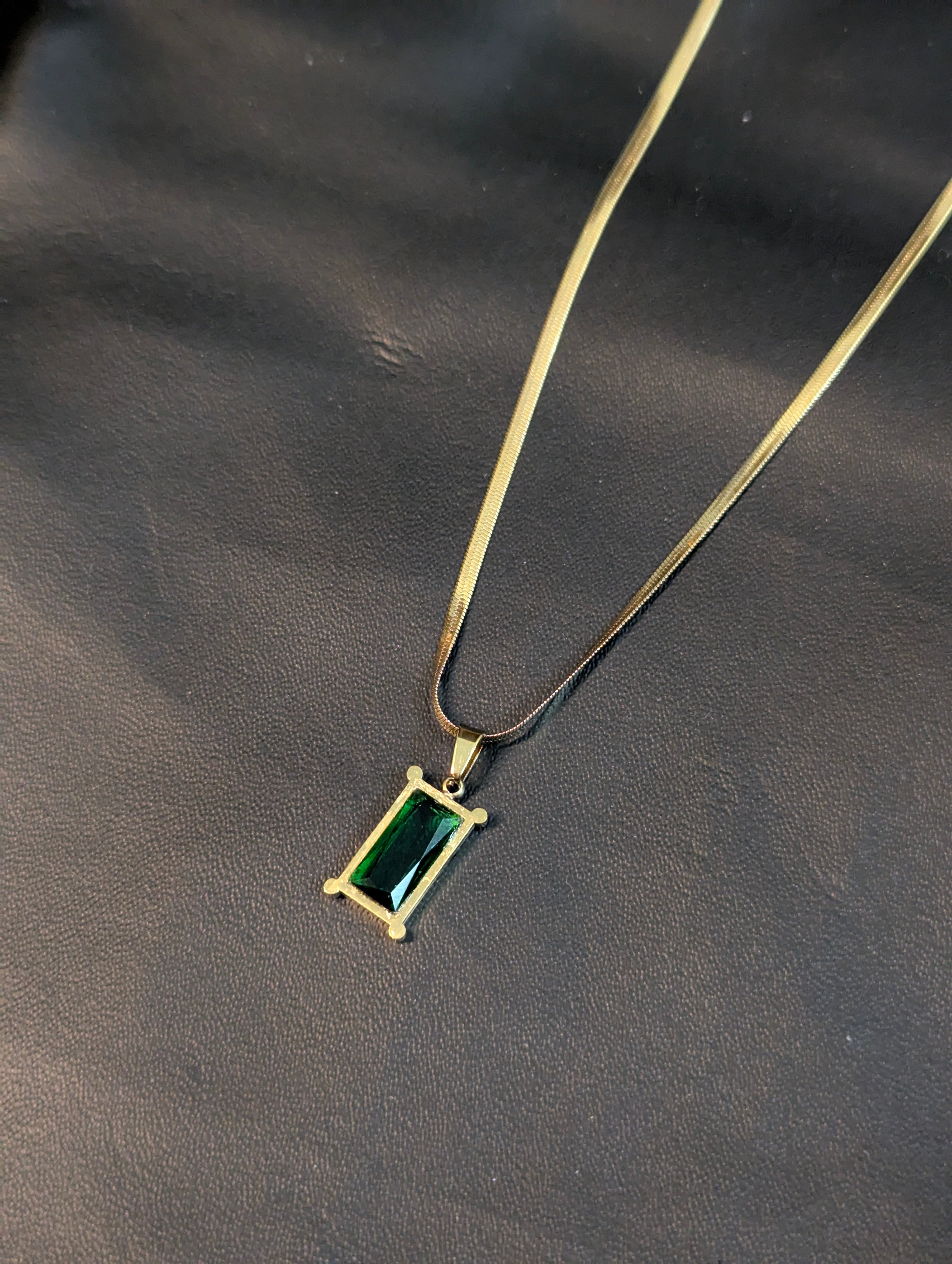 Anti-Tarnish necklace with a rectangular green gemstone pendant