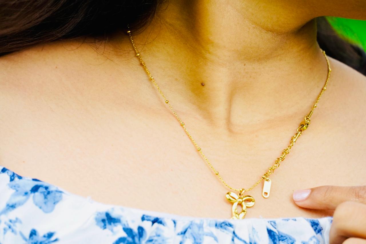 Anti-Tarnish infinity bow pendant necklace
