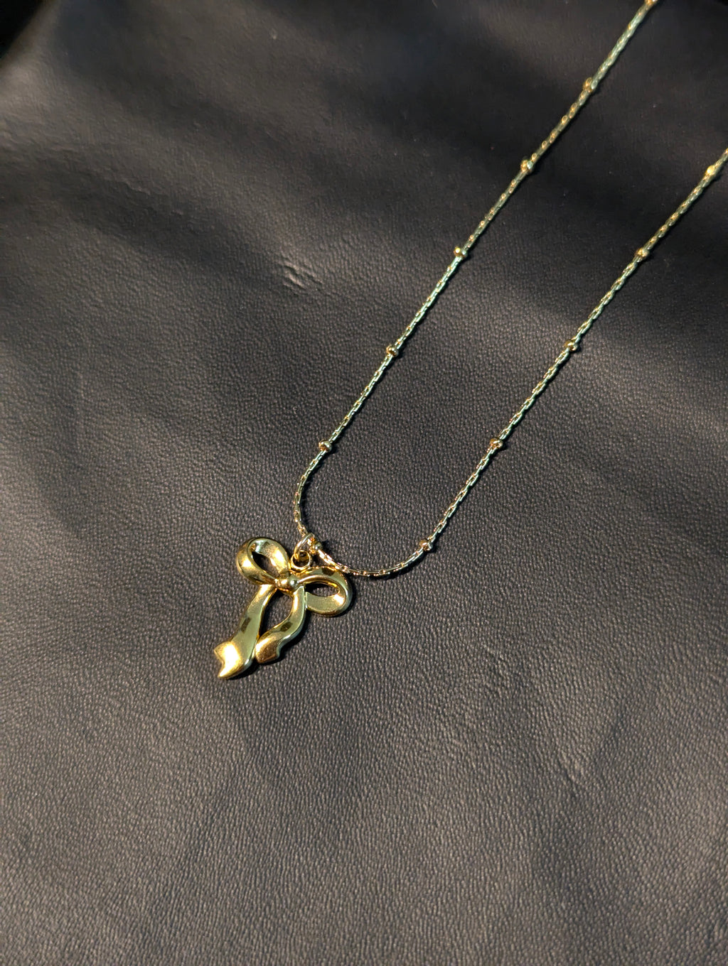 Anti-Tarnish infinity bow pendant necklace